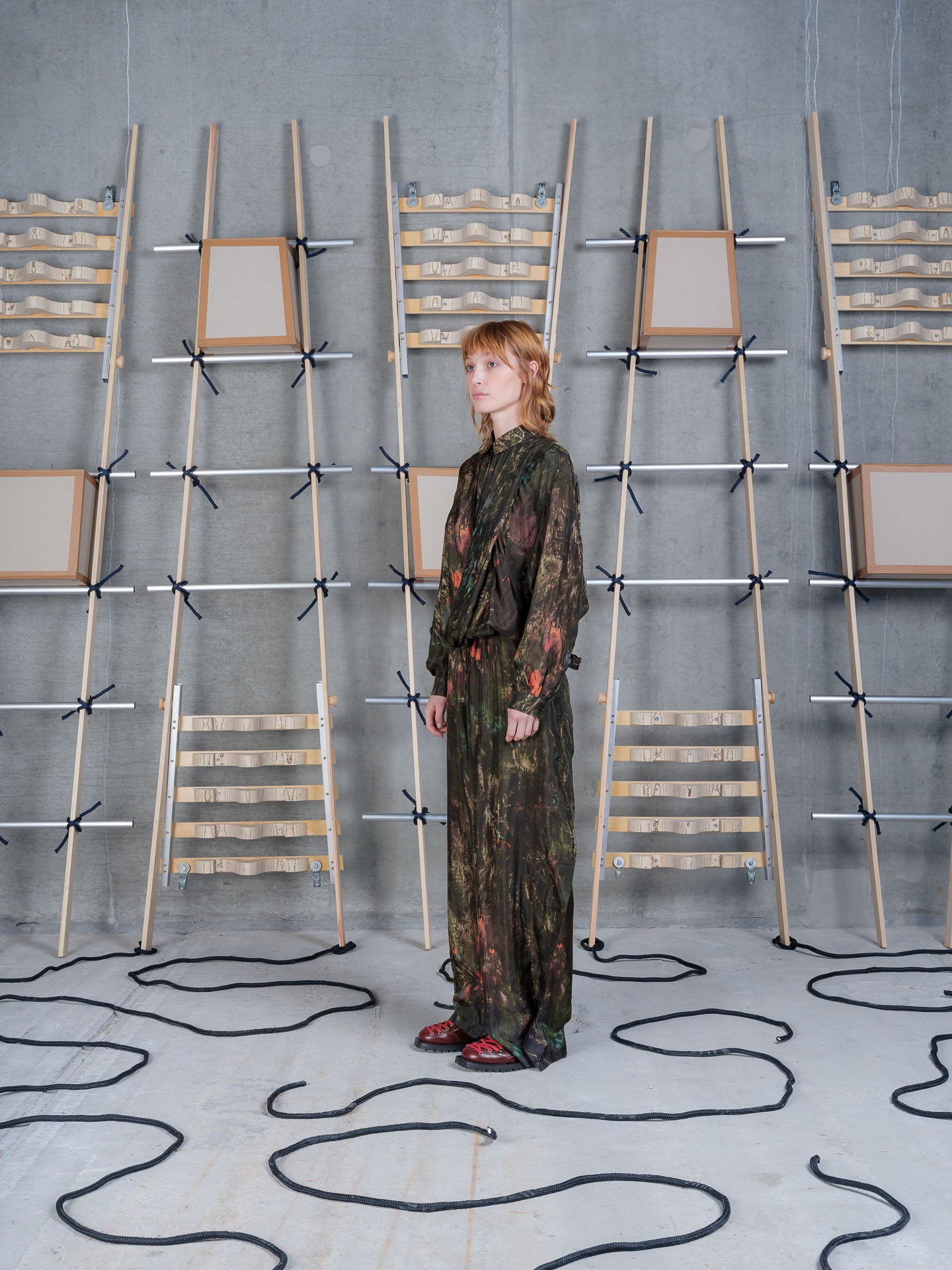 Henrik Vibskov Fold Pants Swamp Reflections, model side view, showing wide leg and fluid drape