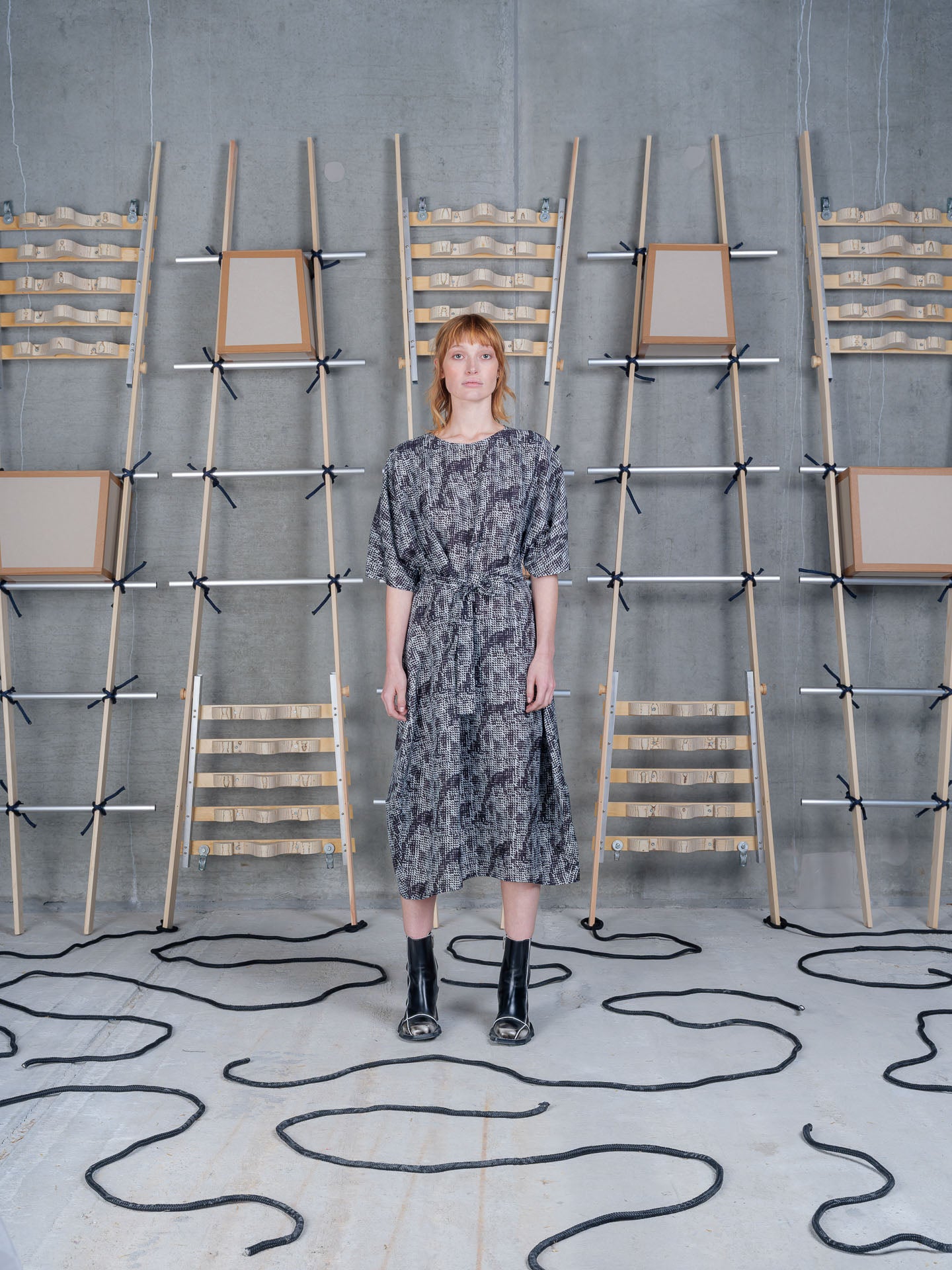 Model wearing the Henrik Vibskov Frown Silk Dress in Jumping Gents print, front view