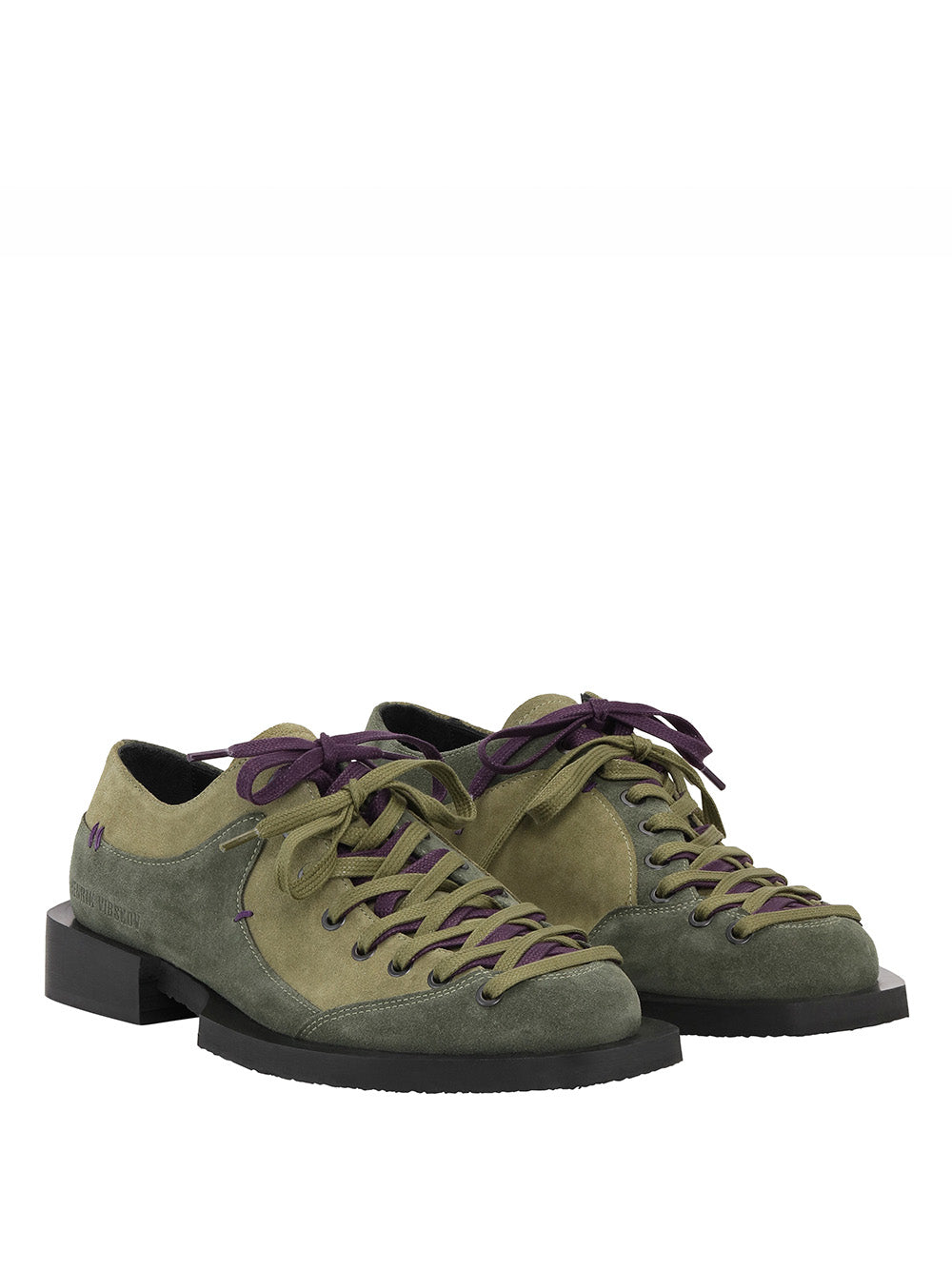 Packshot of the Kelly Shoes Suede in Green from Henrik Vibskov Spring/Summer 2026 Studio Collection, showing the green suede upper, black sole, and two-tone laces.