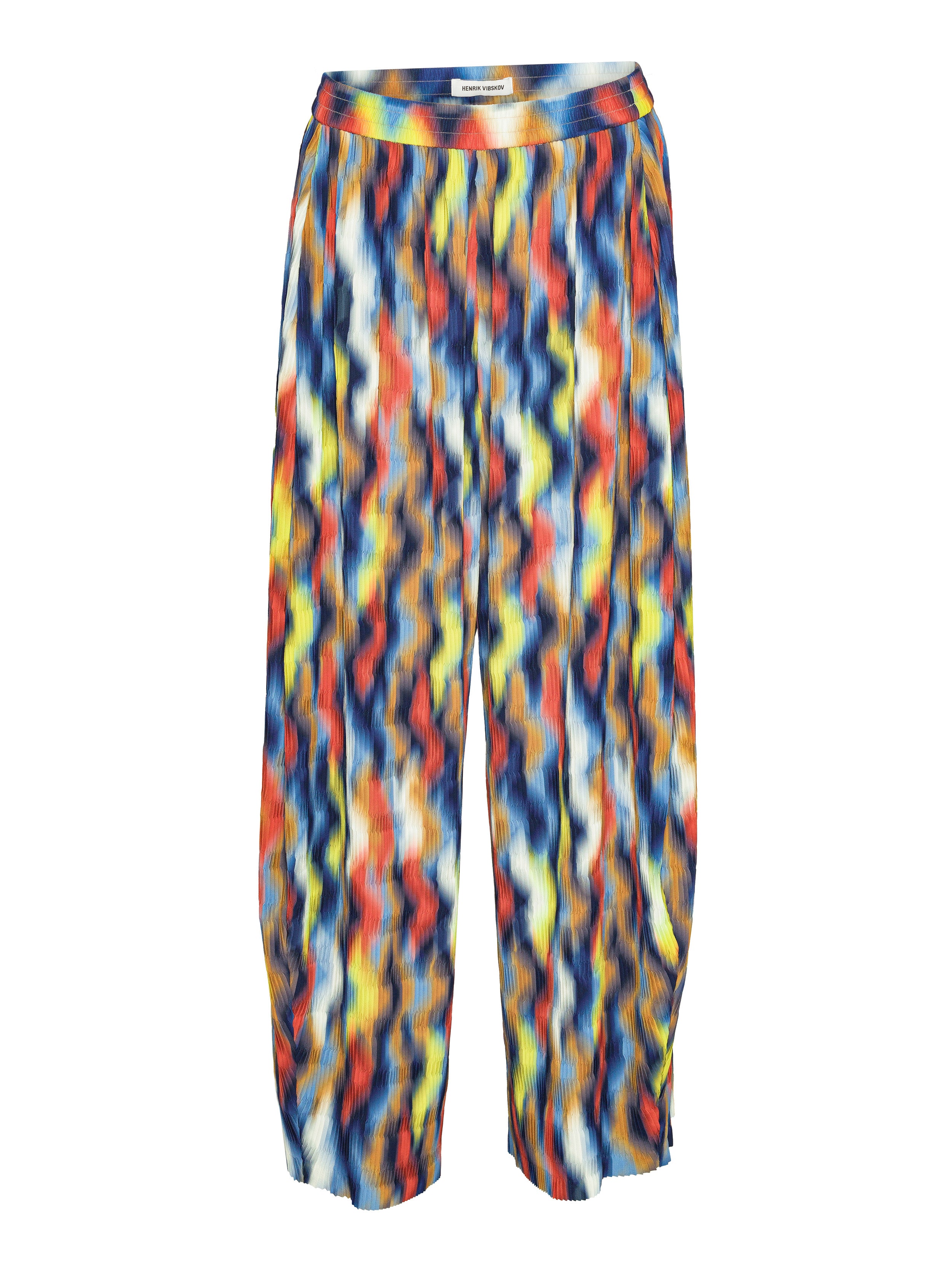 Colorful abstract patterned pants from Henrik Vibskov on a white background