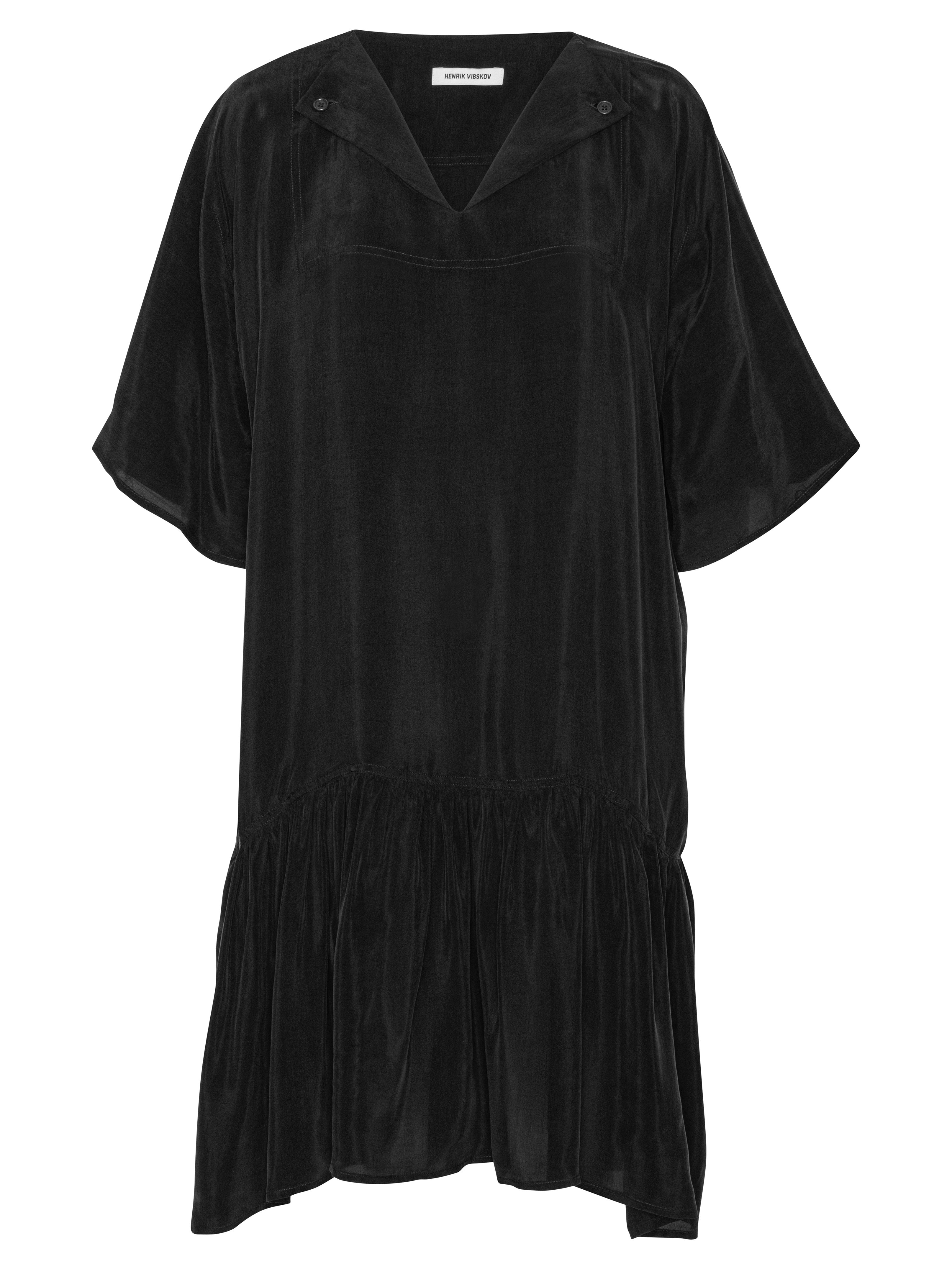 Front view of the Henrik Vibskov Preserve Dress in black, showing the loose fit, V-neck with button closure, short sleeves, and straight hem.