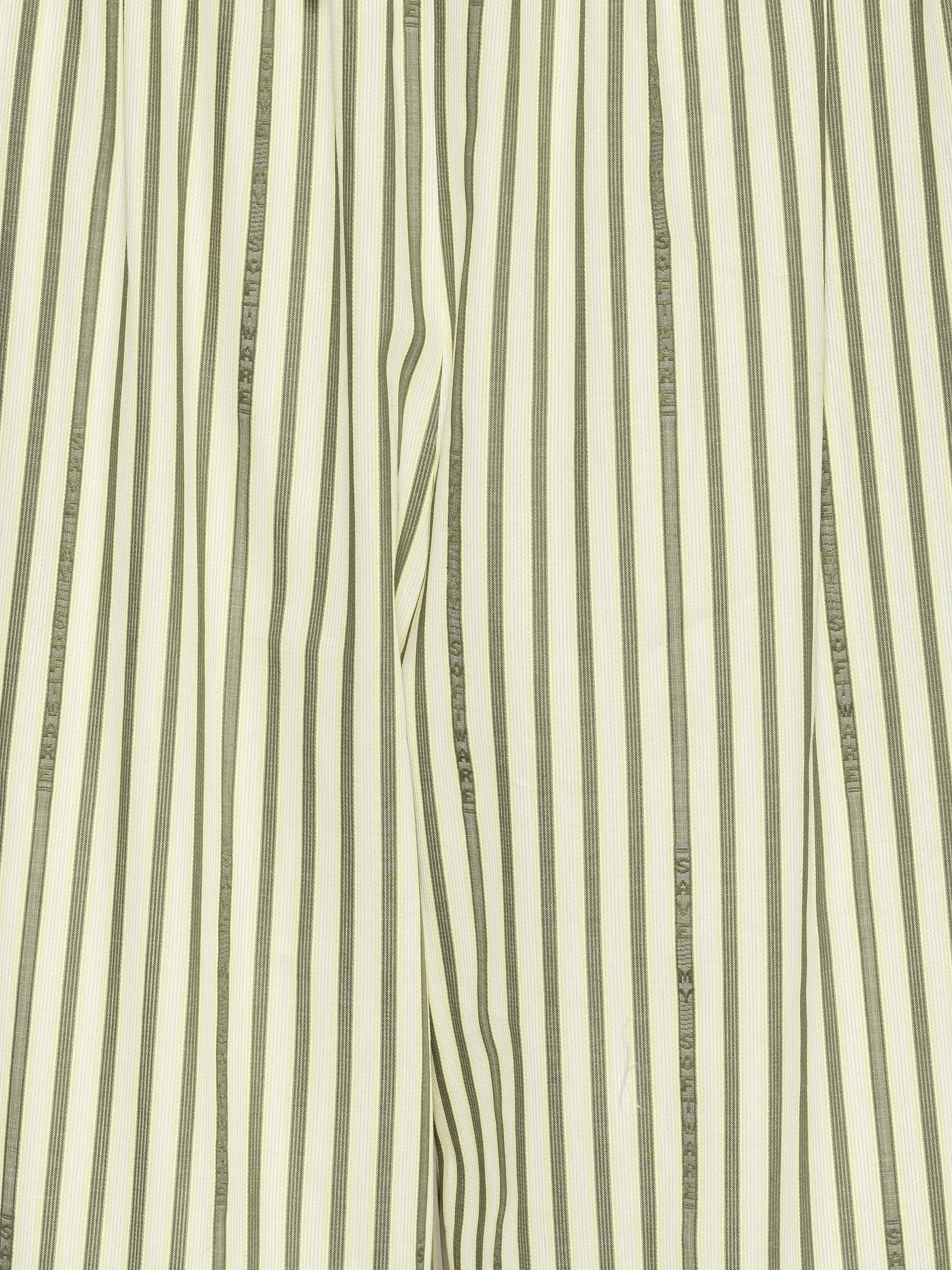 Close-up highlighting the striped fabric, subtle text on the stripes, and layered design on the wide legs.