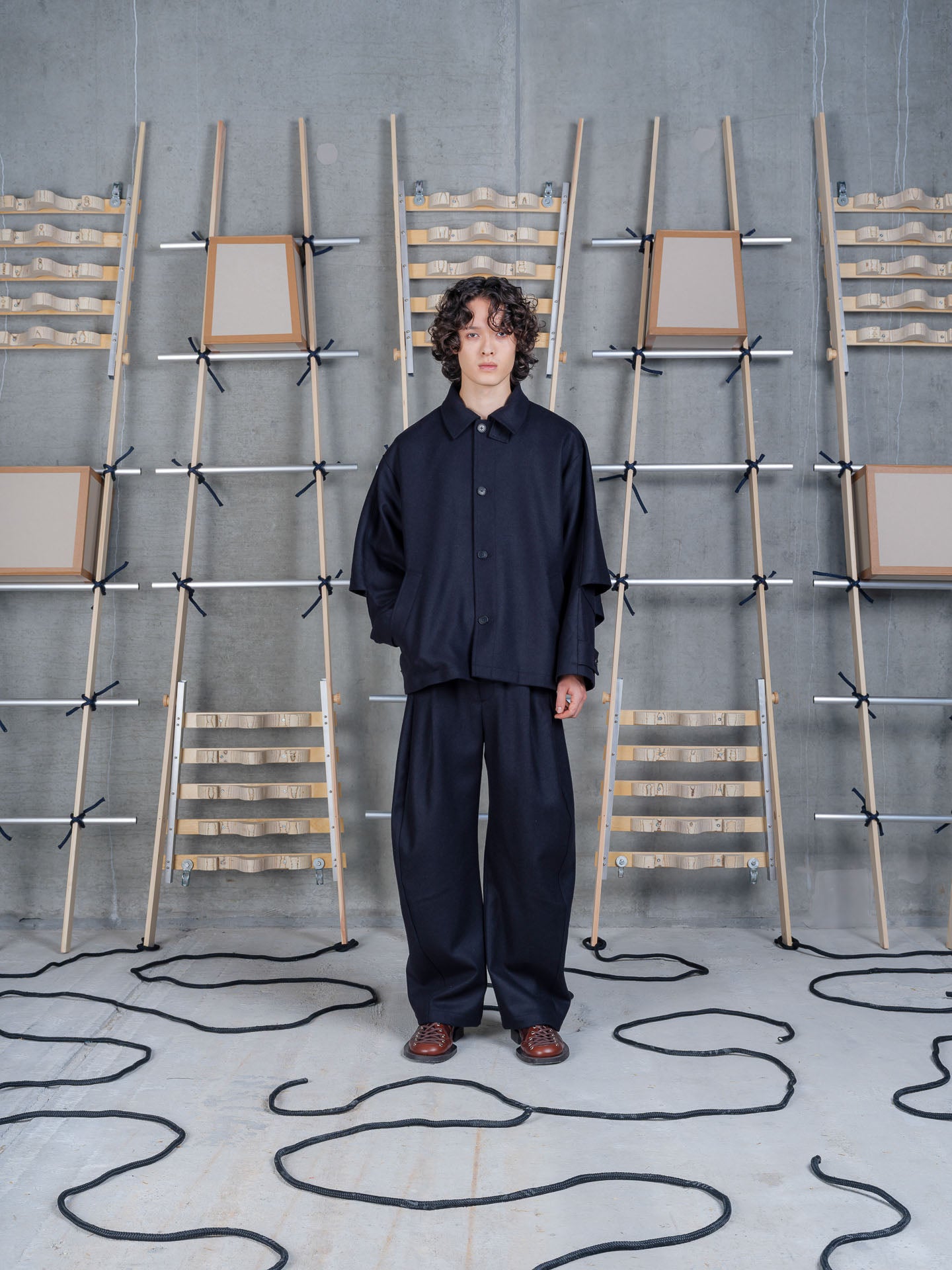 Henrik Vibskov Uncut Jacket Black, model front view, styled with matching wide-leg trousers