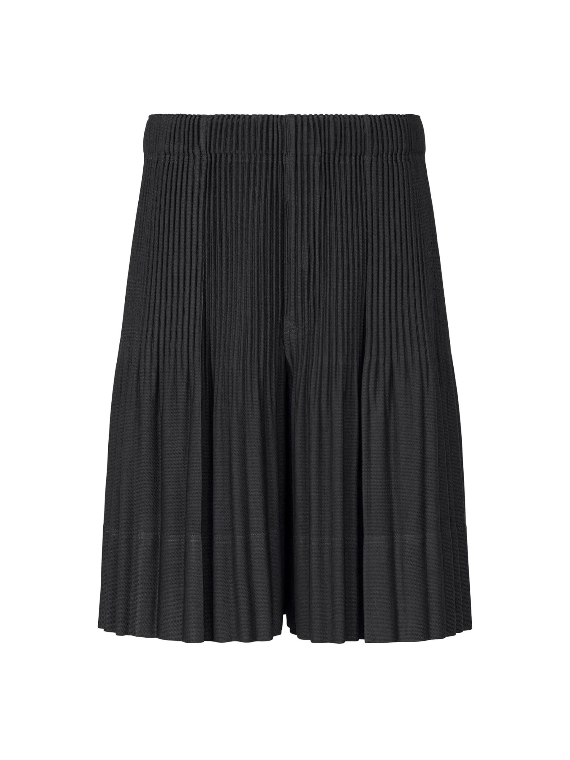 Issey Miyake Homme Plissé June SS26 Pleated Shorts in Black, front flat lay showing wide-leg silhouette, vertical pleat texture and elasticated waistband, Homme Plissé Spring/Summer 2026 Collection