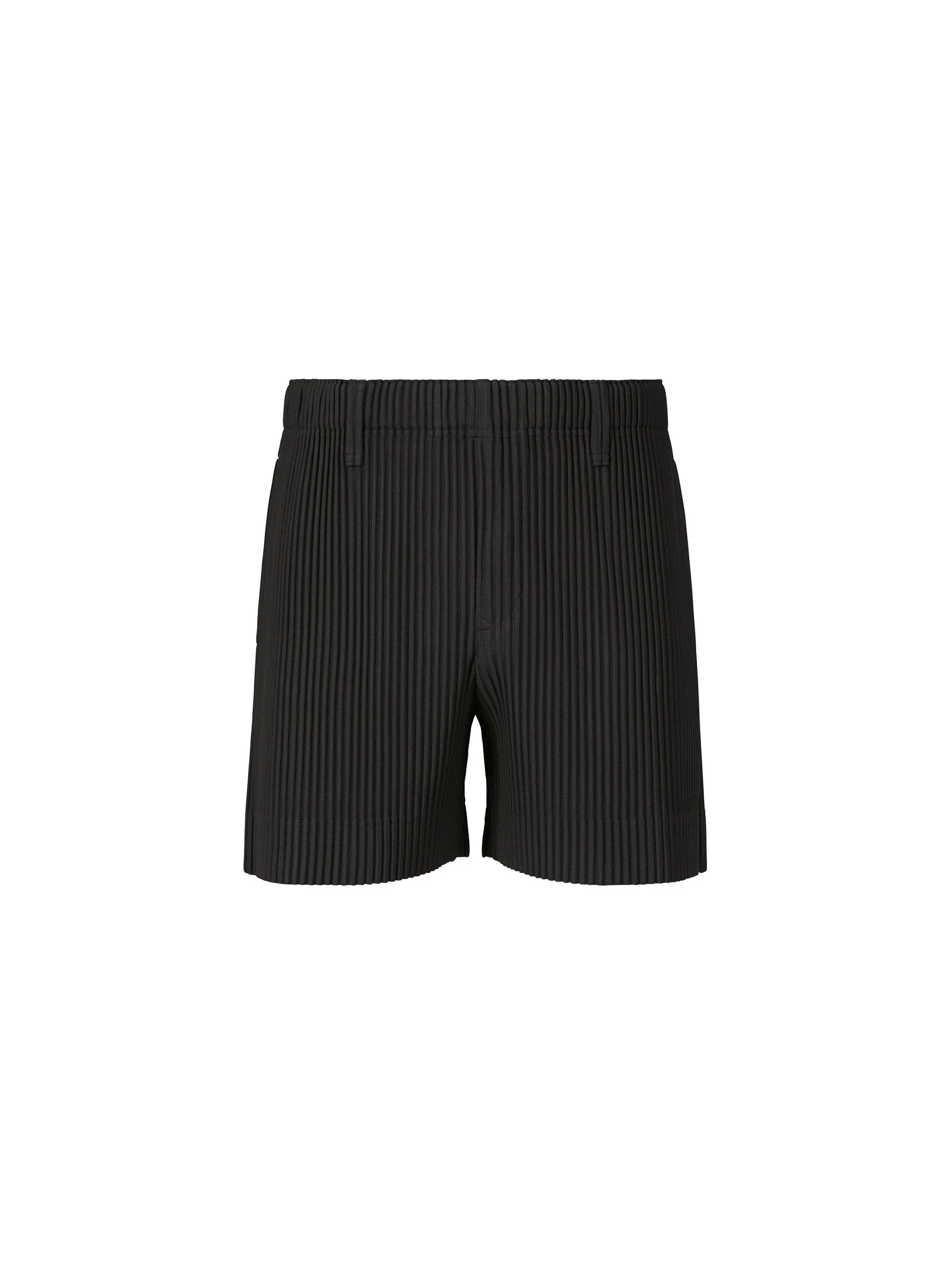 Issey Miyake Homme Plissé Tailored Pleats 3 Pants in Black, front view, signature vertical pleating, clean short silhouette, elasticated waistband, button fly, belt loops, side pockets, quick-dry polyester, SS26