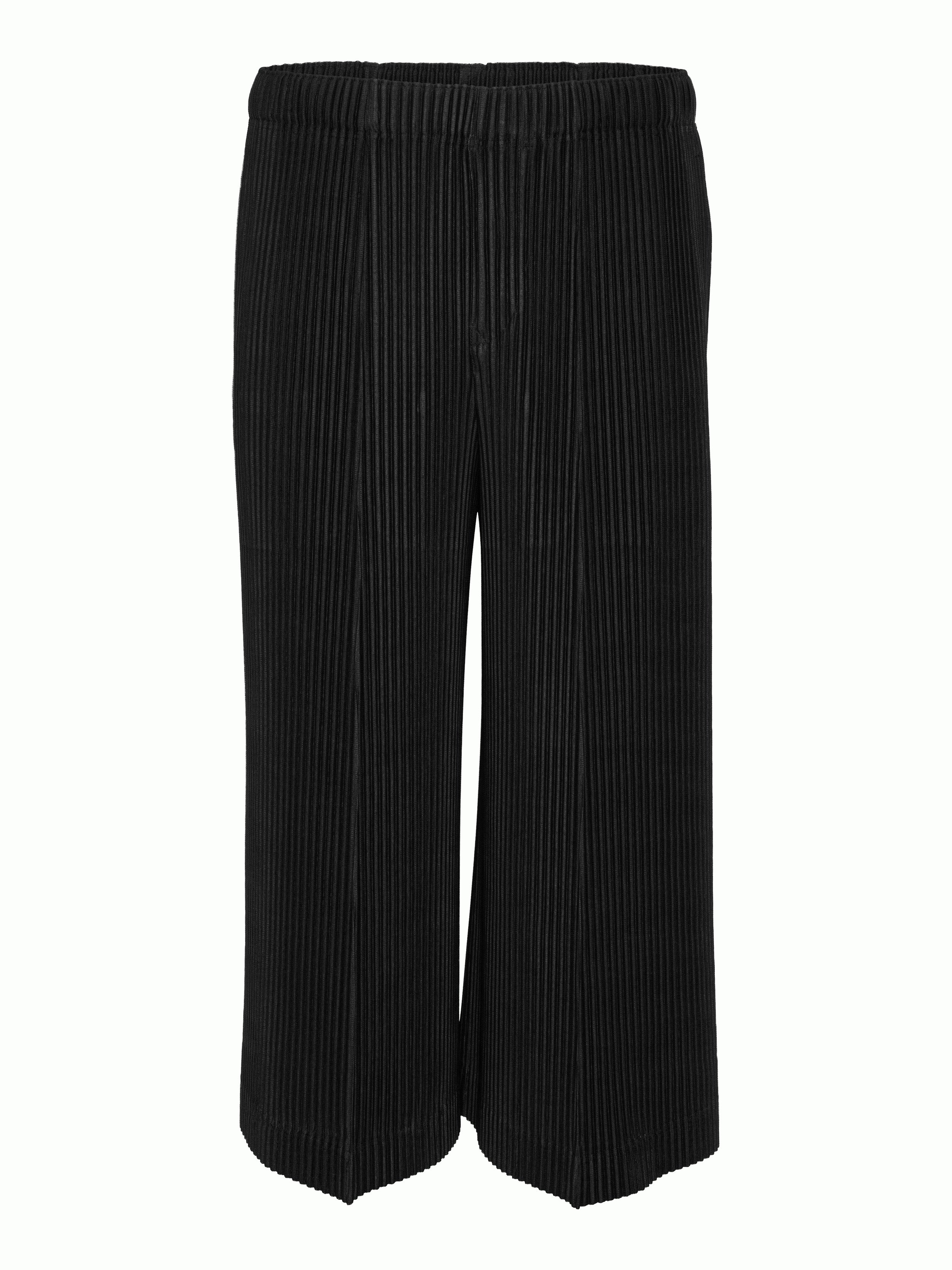 Front view of black plissé shorts from Issey Miyake Homme Plissé
