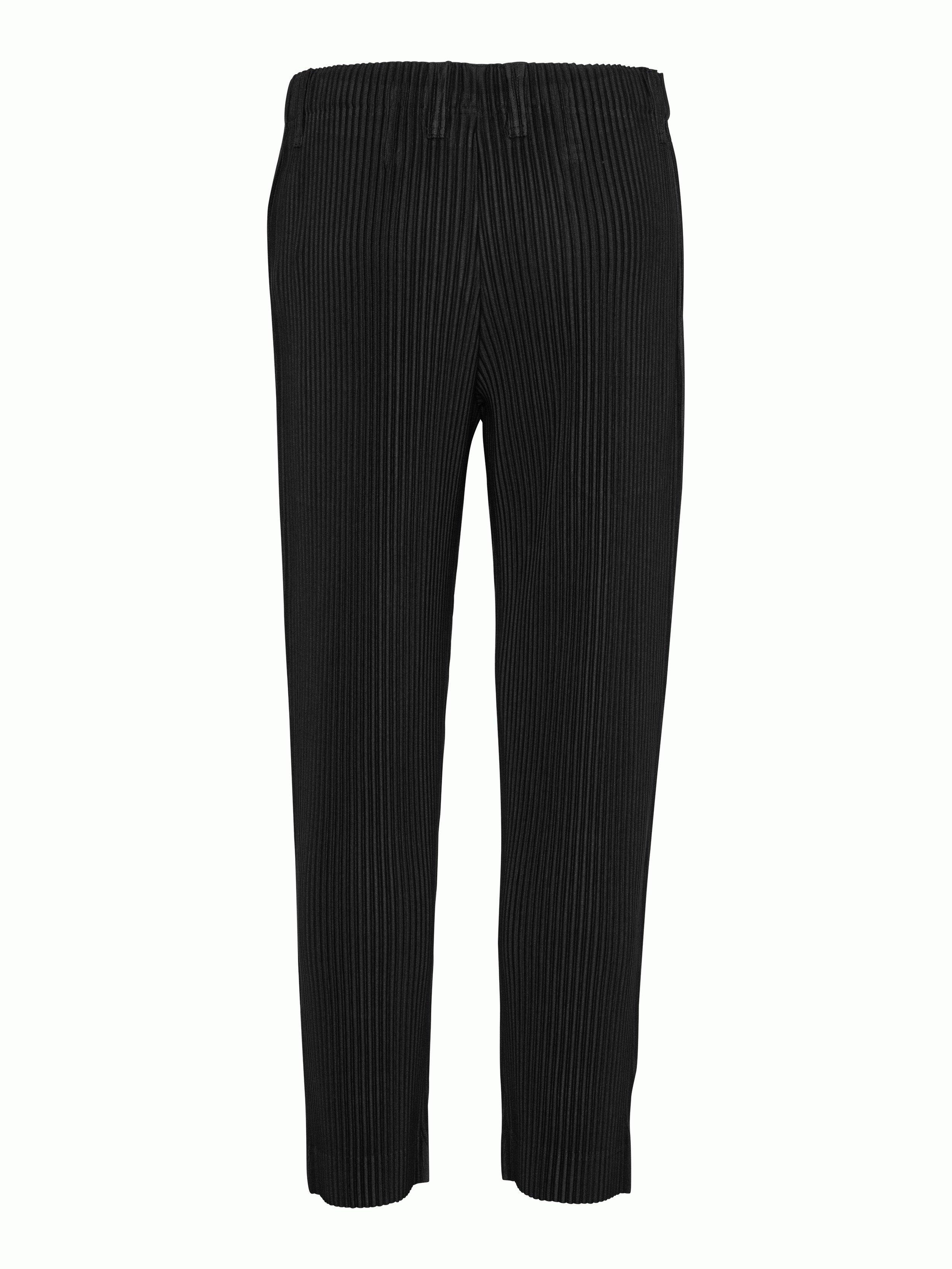 Back view of the black plissé pants with straight legs from Homme Plissé Issey Miyake
