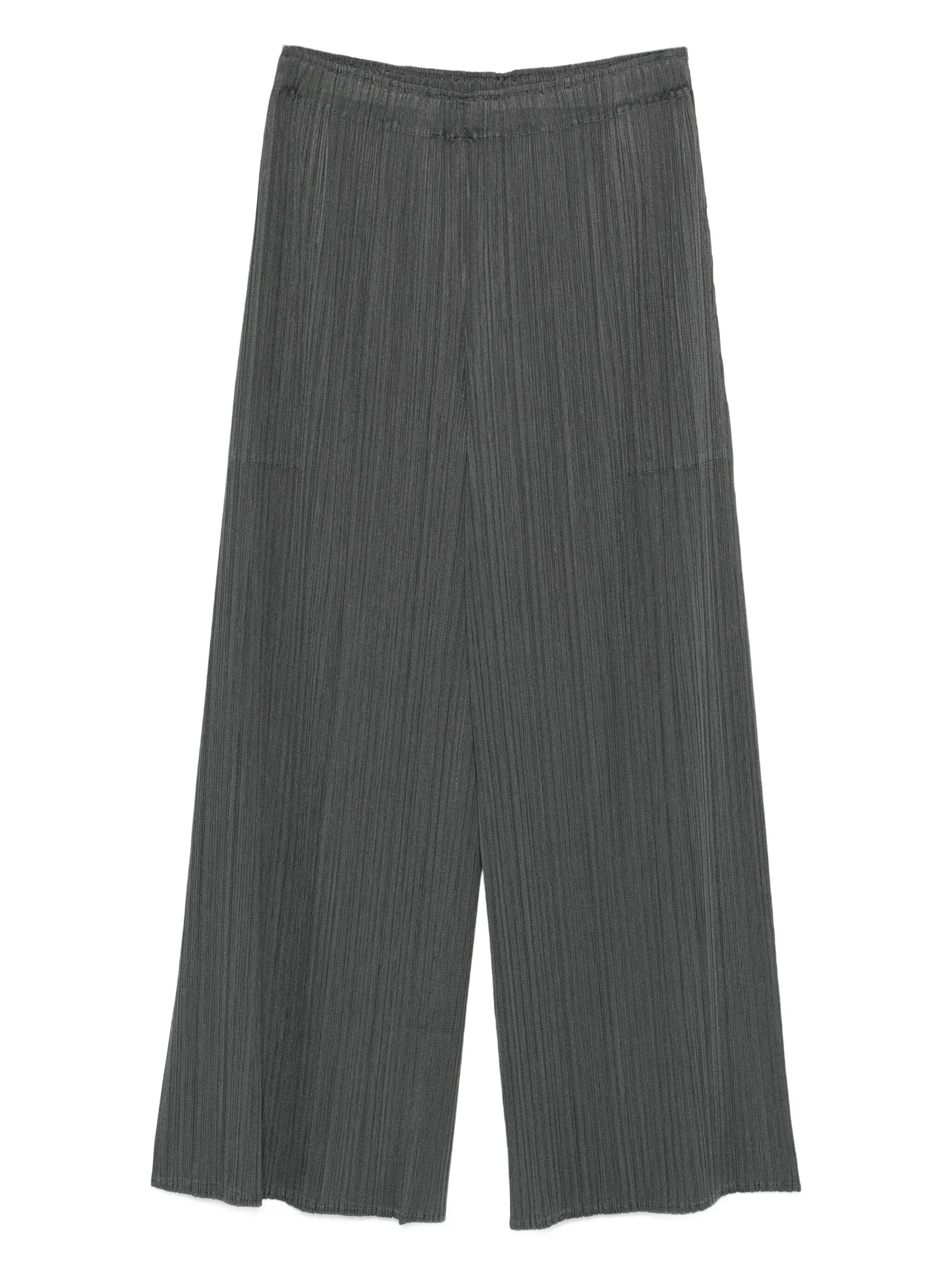 Gray pleated pants from Pleats Please Issey Miyake on a white background