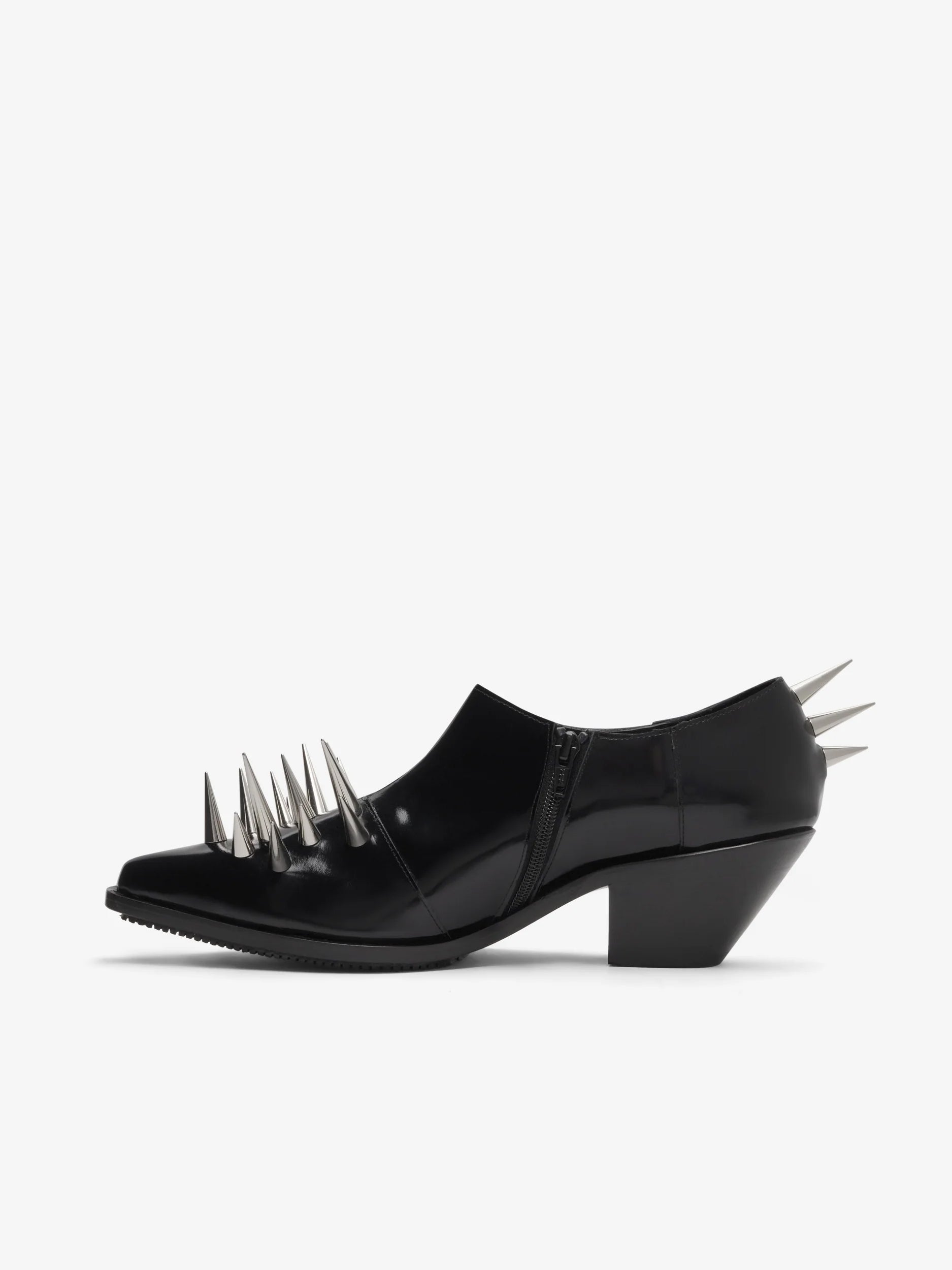 unya Watanabe Women's Spiked Leather Shoes in Black, outer side view showing the polished patent leather and sculptural spiked upper.