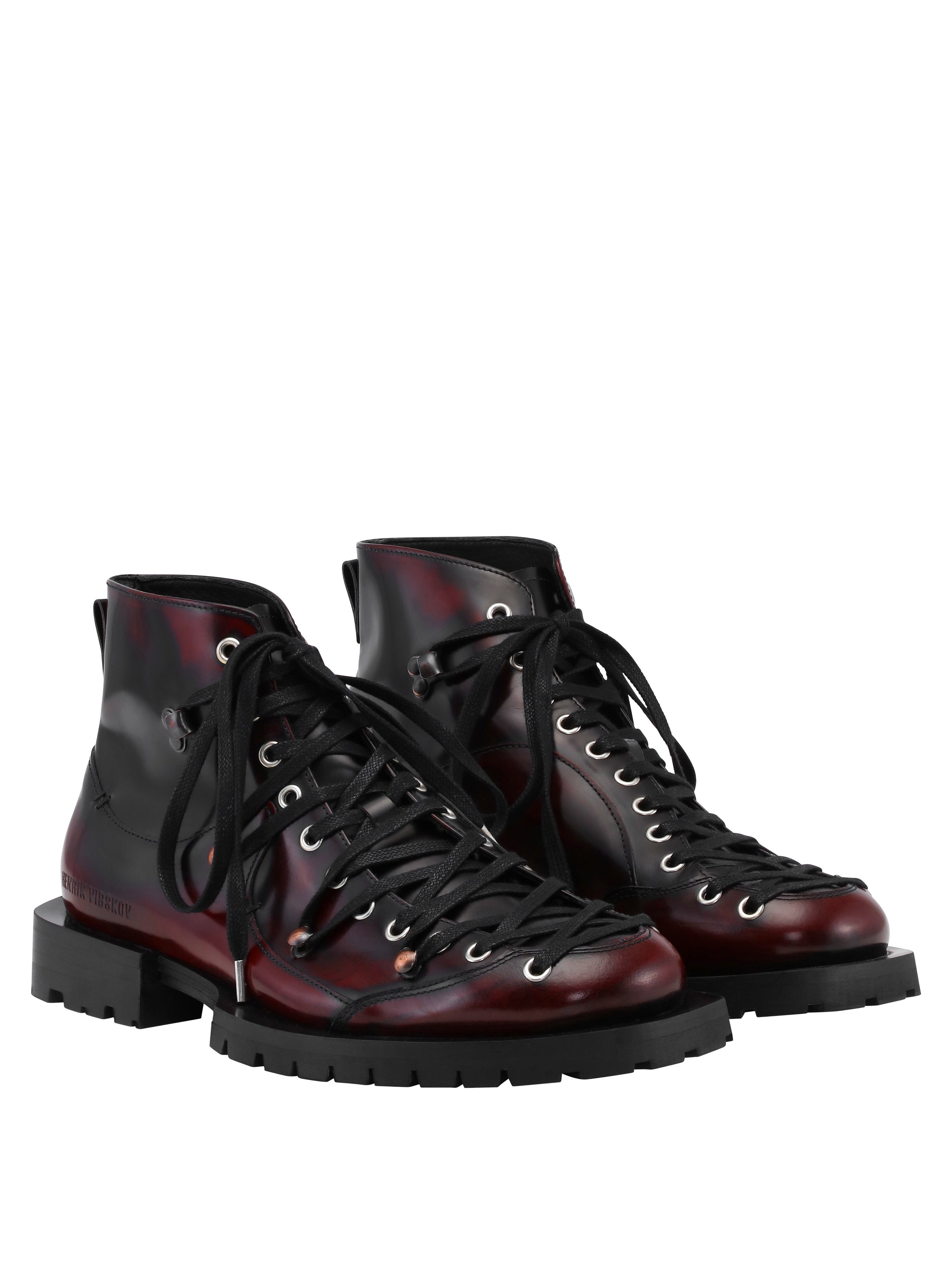 Henrik Vibskov Kelly Boots in Red Brush Off leather with lace-up front and chunky rubber sole.e