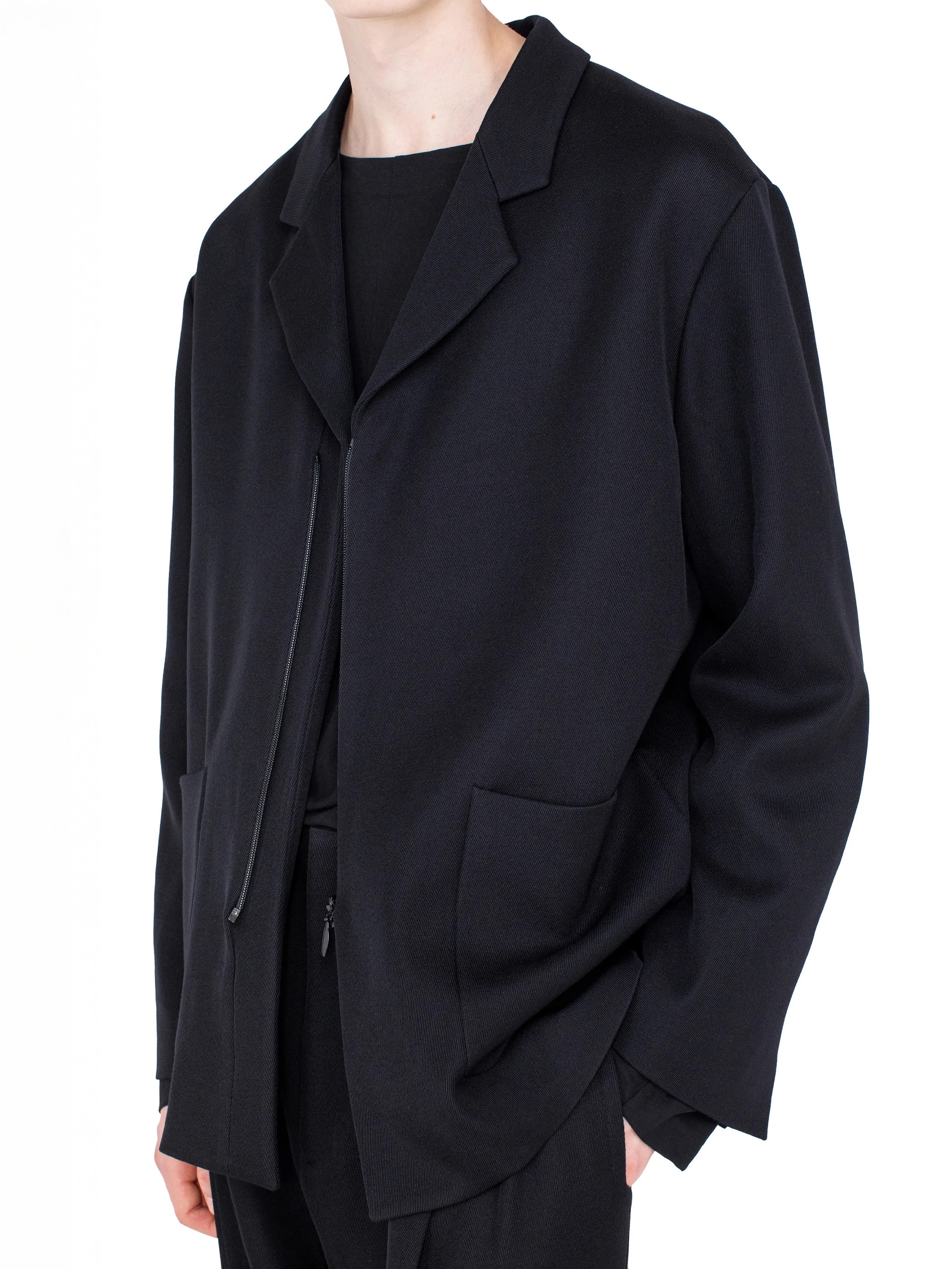 Kiko Kostadinov Votive Zip Blazer in black Japanese wool twill with relaxed fit, invisible zip-front closure, patch pockets and soft tailored construction
