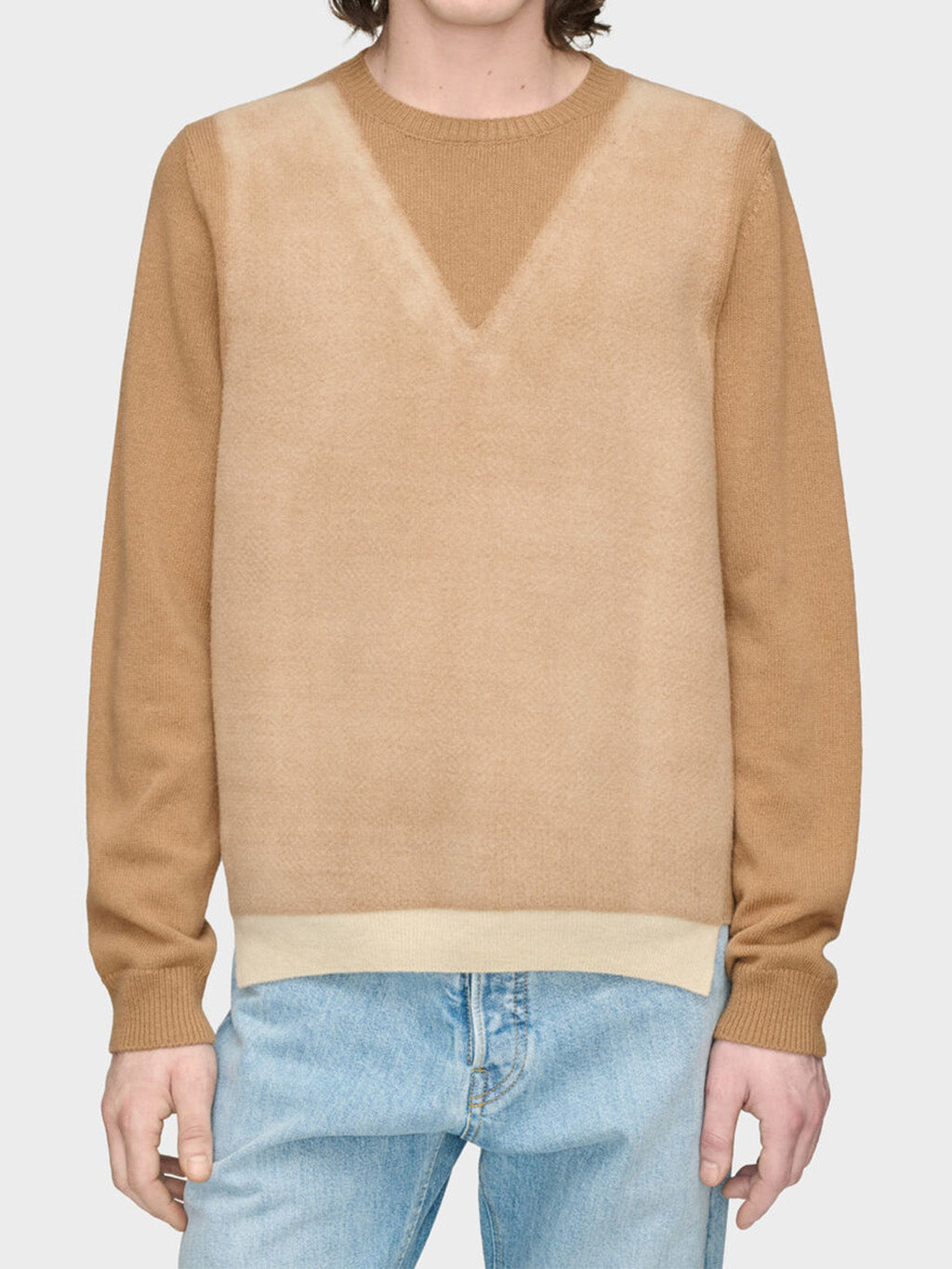 Maison Margiela Fused Knit Wool Crewneck Sweater camel, worn front-on with light-washed jeans showing trompe l'oeil V-neck and ecru hem detail