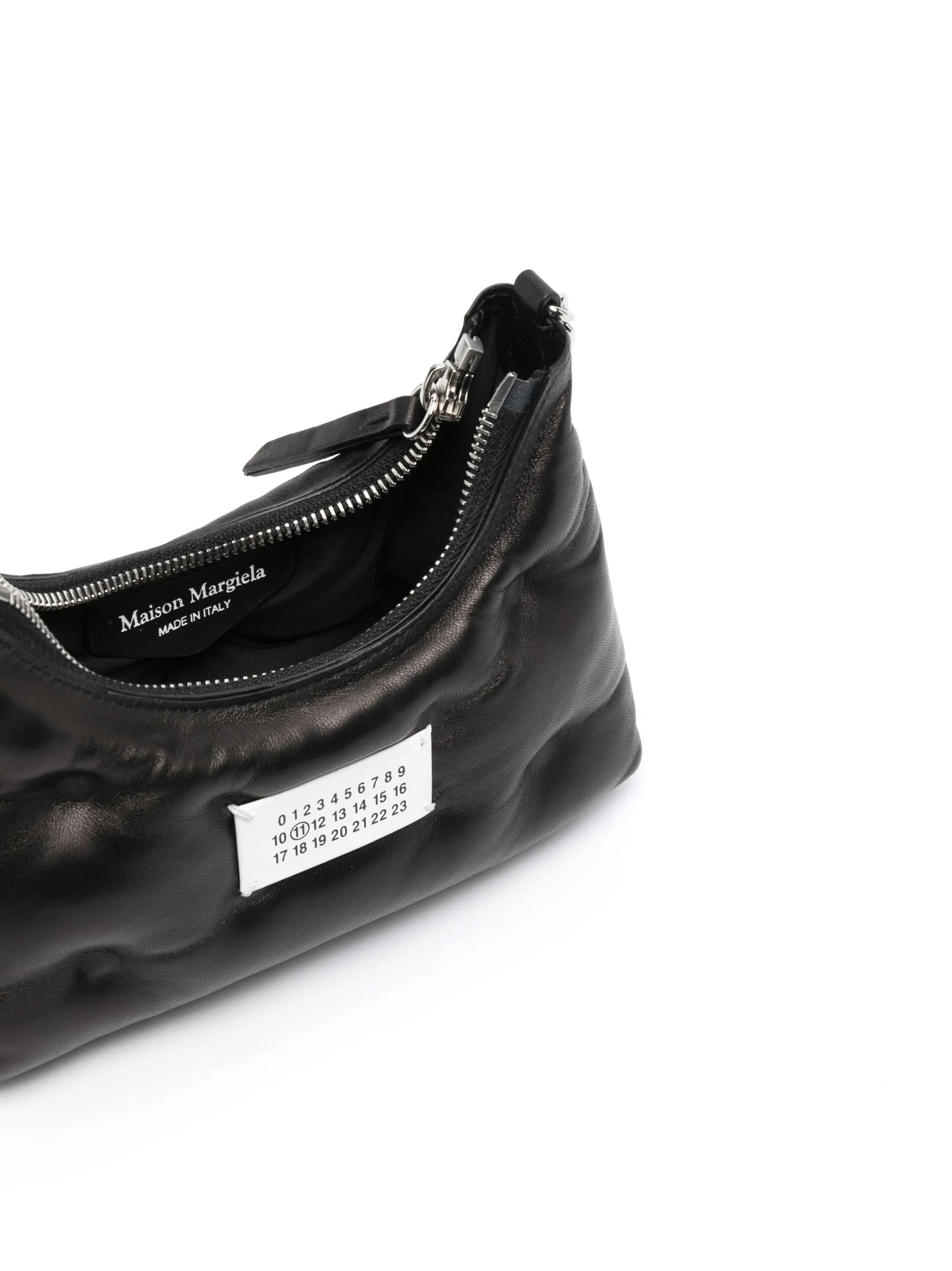 Top view of Glam Slam Hobo Micro in Black by Maison Margiela with the zipper open, revealing the main compartment and padded construction.