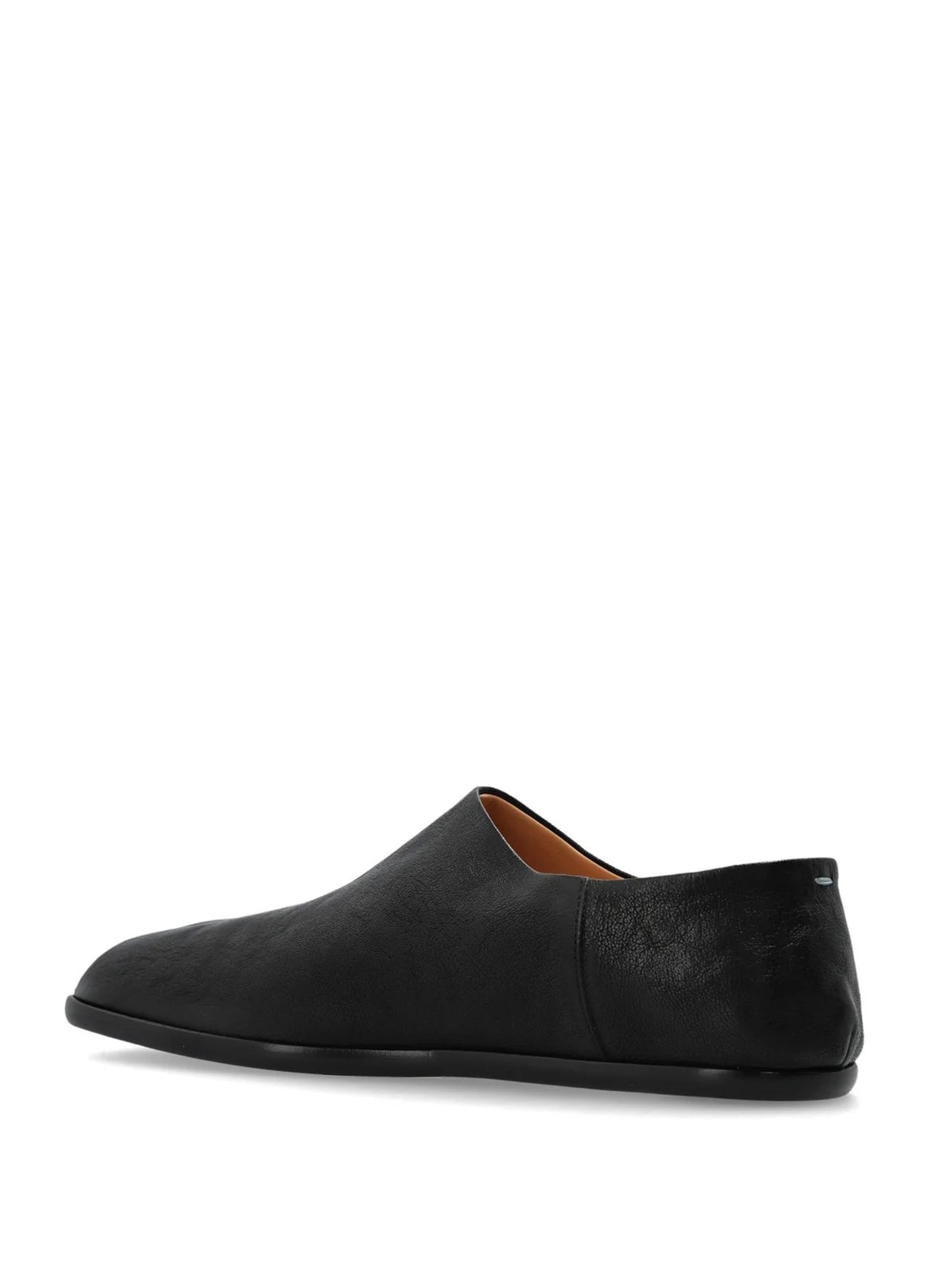 Maison Margiela Tabi Babouches back-angle view showing collapsible heel and signature white stitch detail