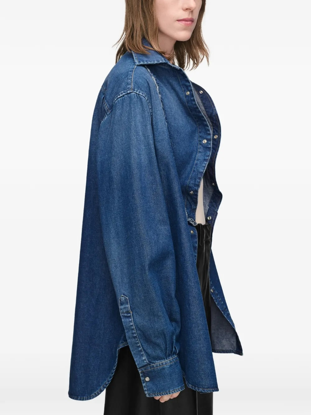 Maison Margiela V-Neck Long-Sleeved Shirt in medium blue - side view, curved hem with side vent and snap button fastening detail