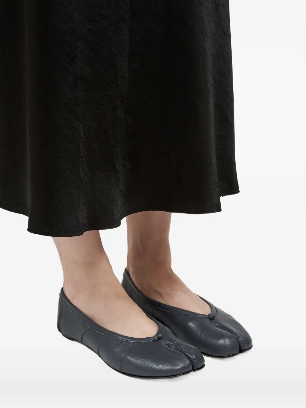 Model wearing Maison Margiela Pleated Ballerina Tabi in Grey.