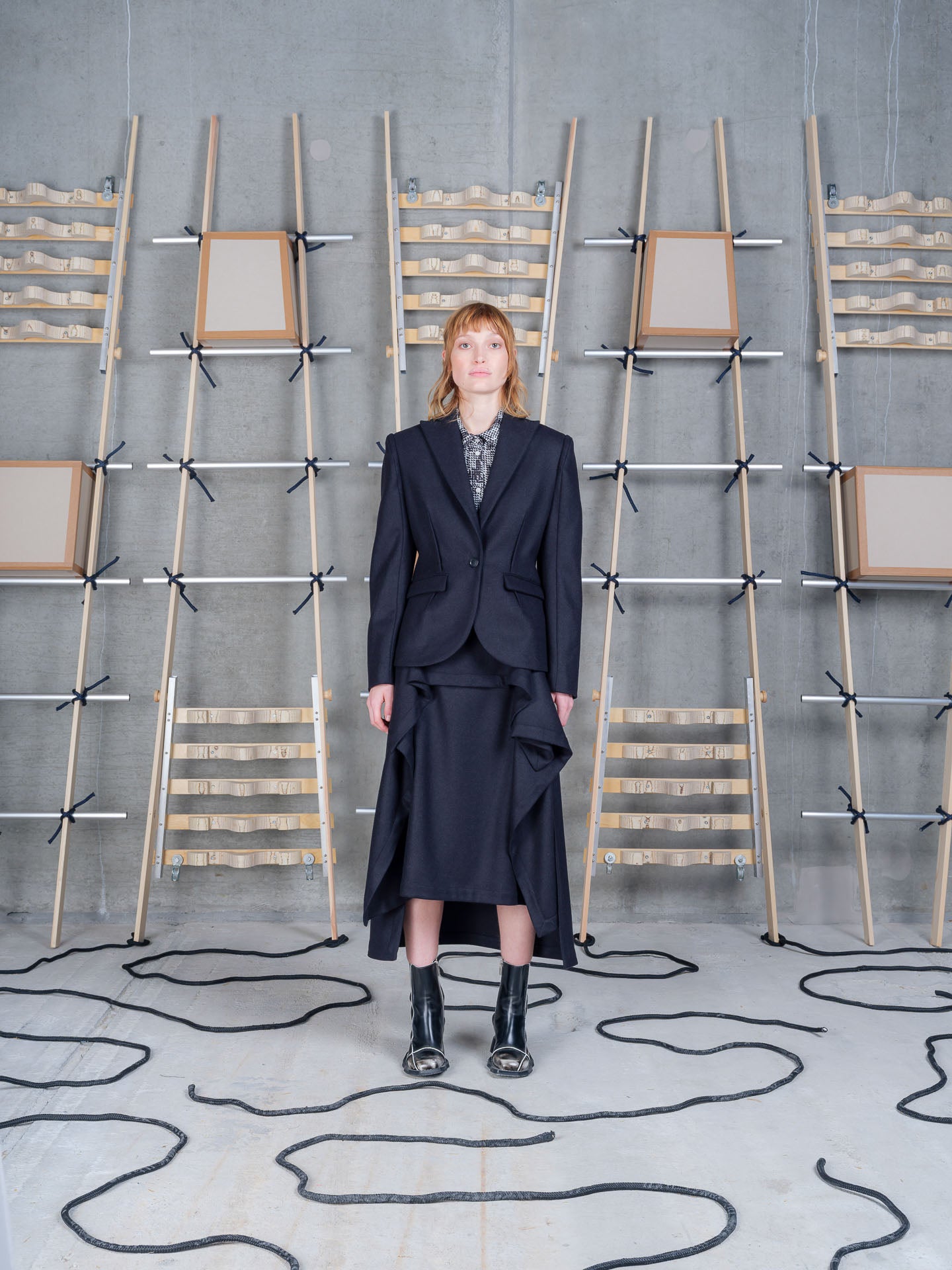 Model wearing Henrik Vibskov Press Blazer in Black front view
