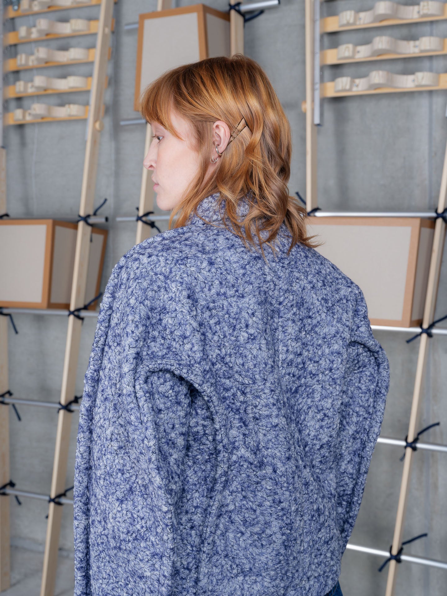 Model wearing Relaxed Dartbi Jacket in Blue Pebbles by Henrik Vibskov back detail

