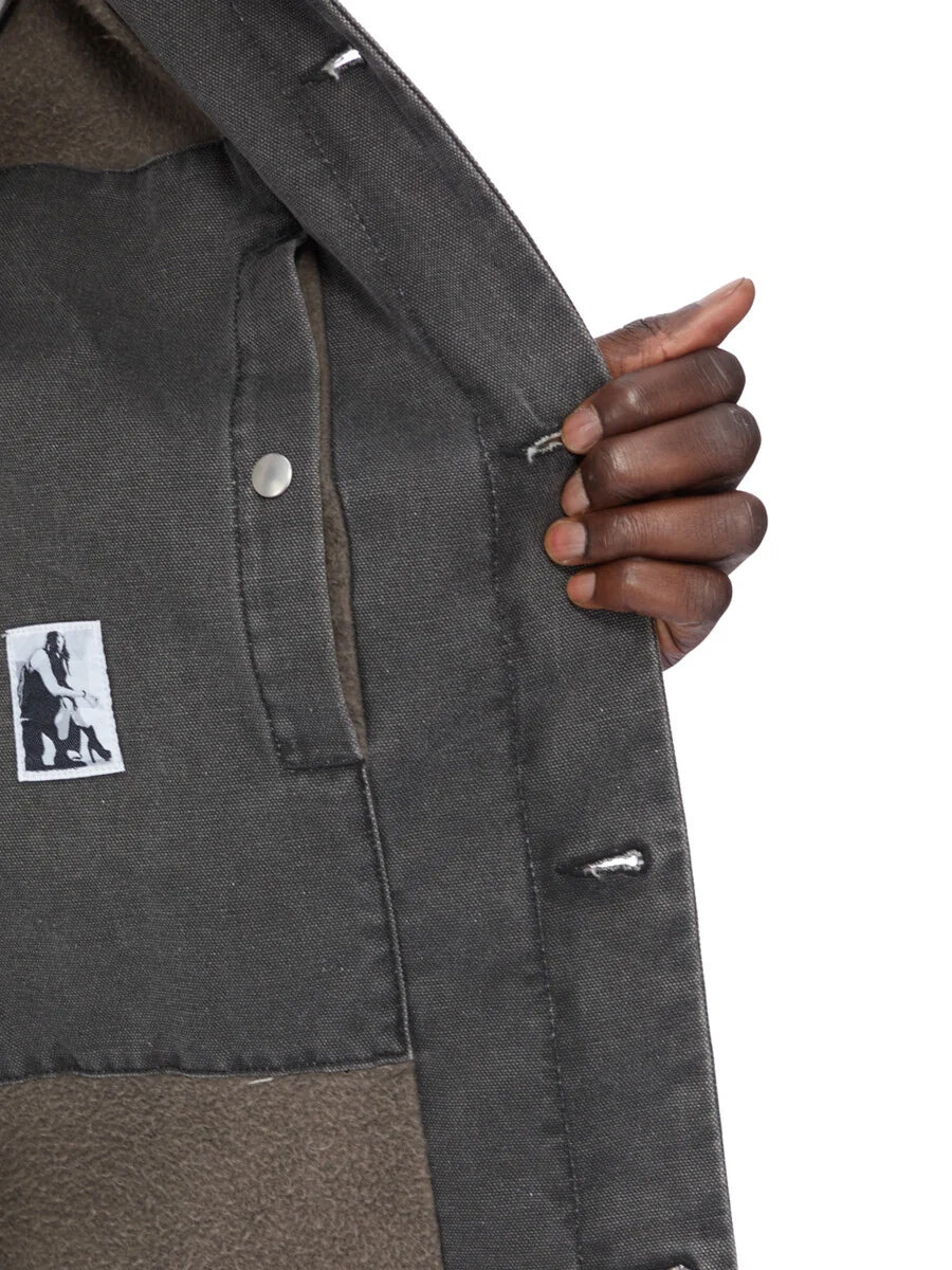 Interior detail of Rick Owens DRKSHDW Brad Jacket in Gravel showing the lining, internal pocket and inside button construction.