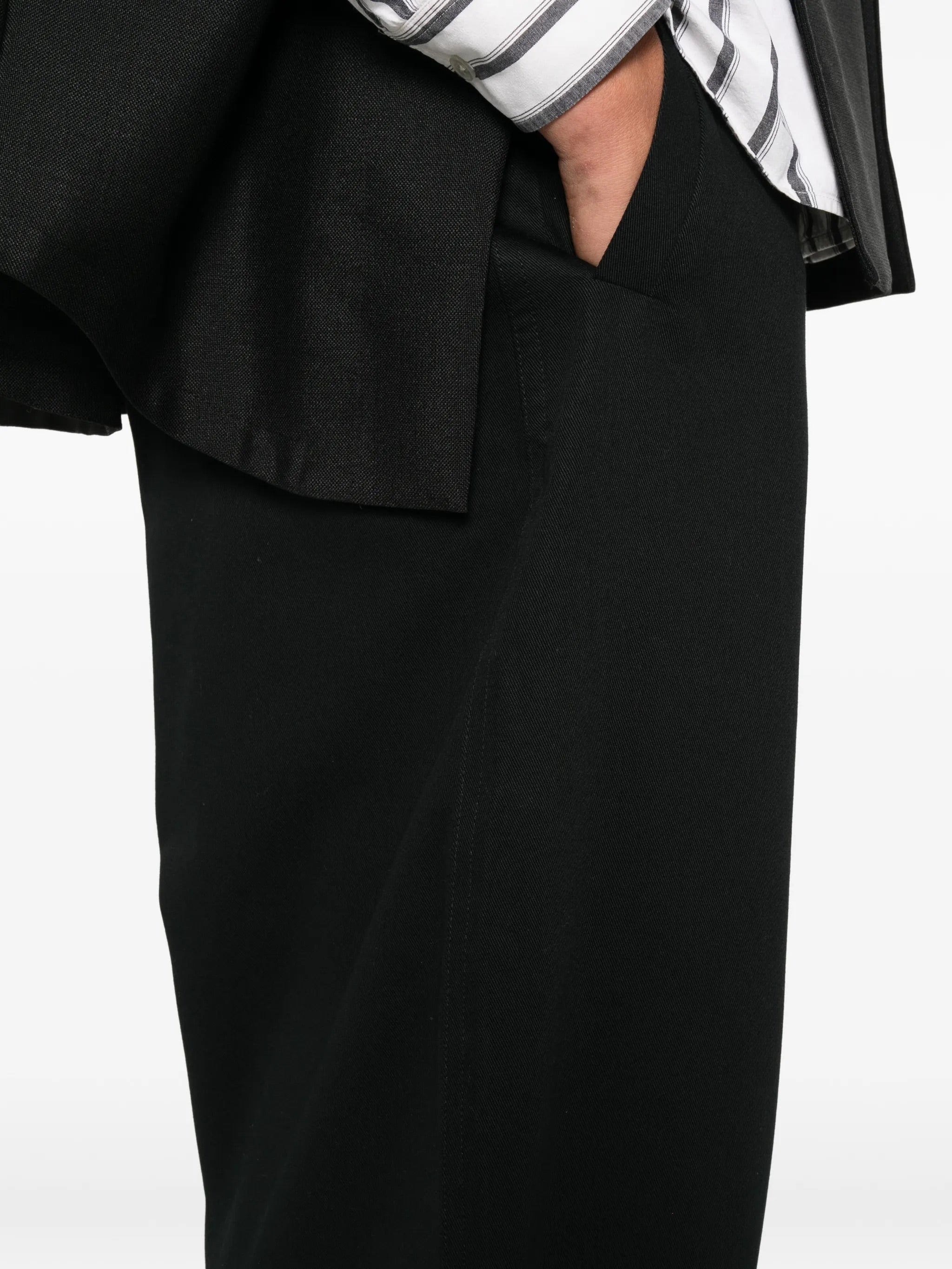 House Of The Very Islands Ryker Pants in Black - detail view showing concealed back pocket and organic cotton fabric