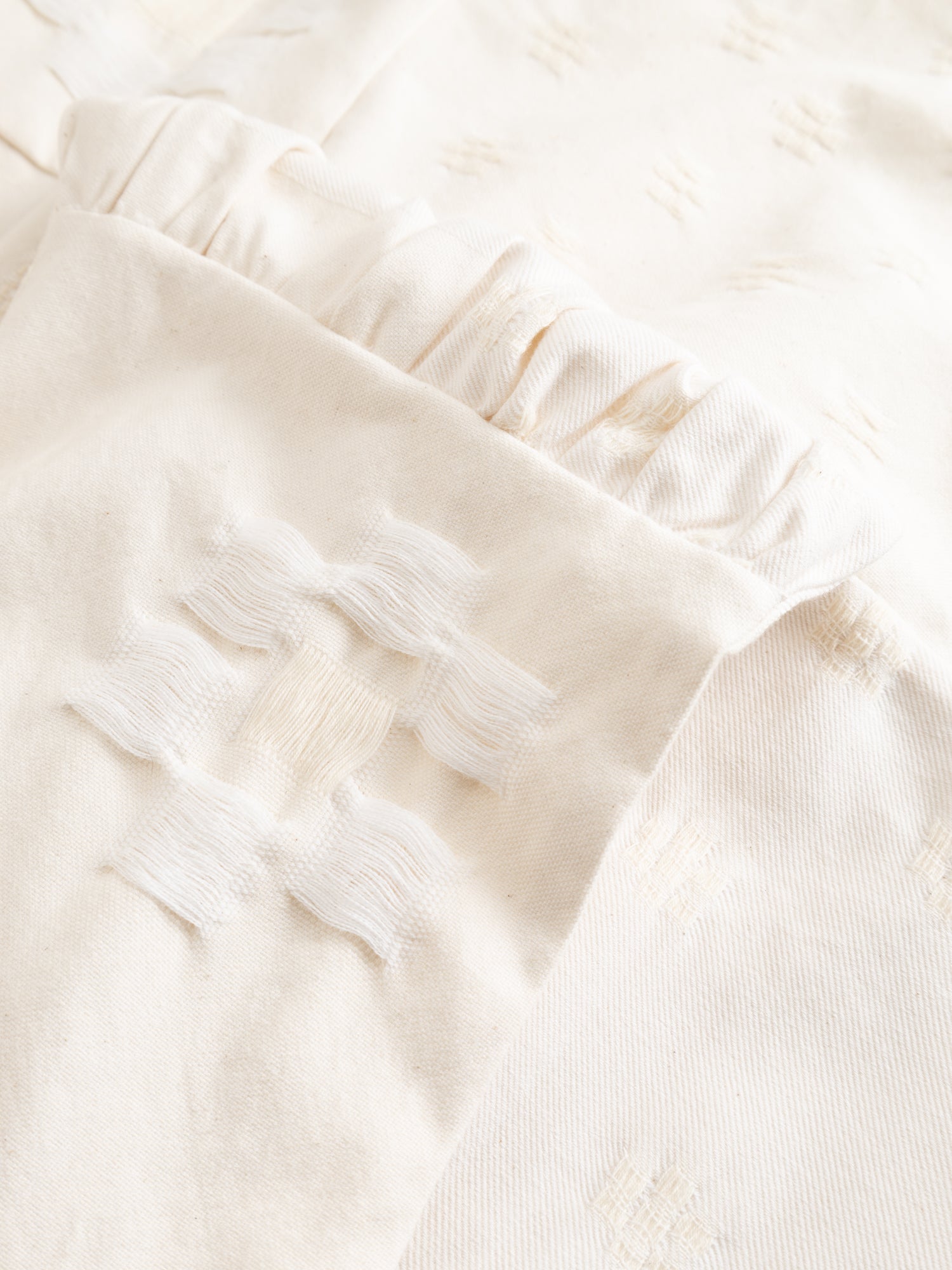 Stem Patchwork Dress in off-white, close-up of gathered waist seam showing patchwork fabric join and Tencel thread detailing