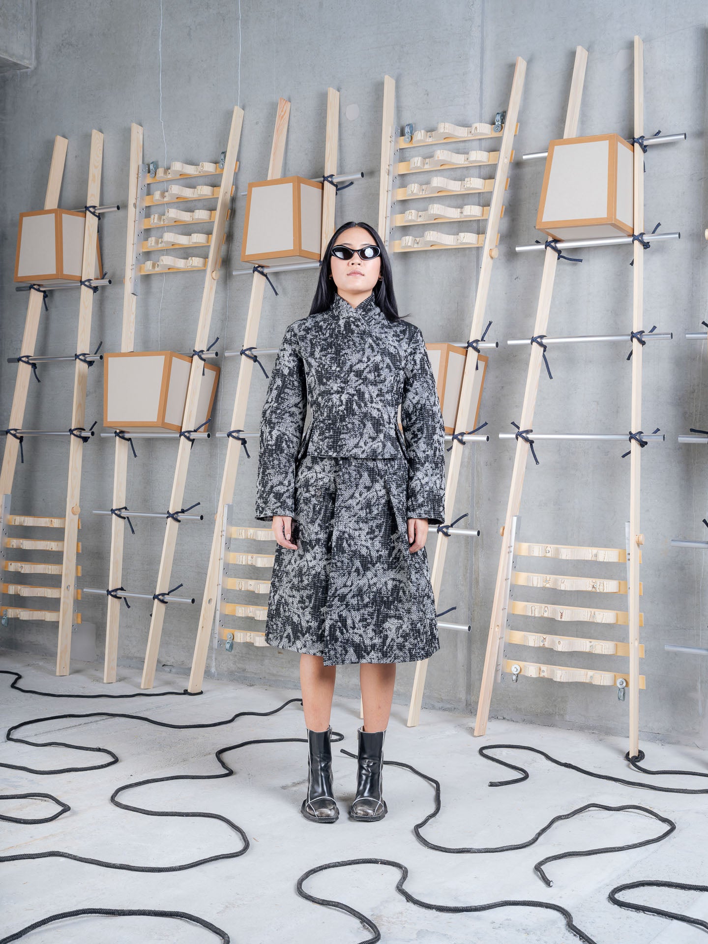 Henrik Vibskov Shell Jacket in Black 3D White worn front view
