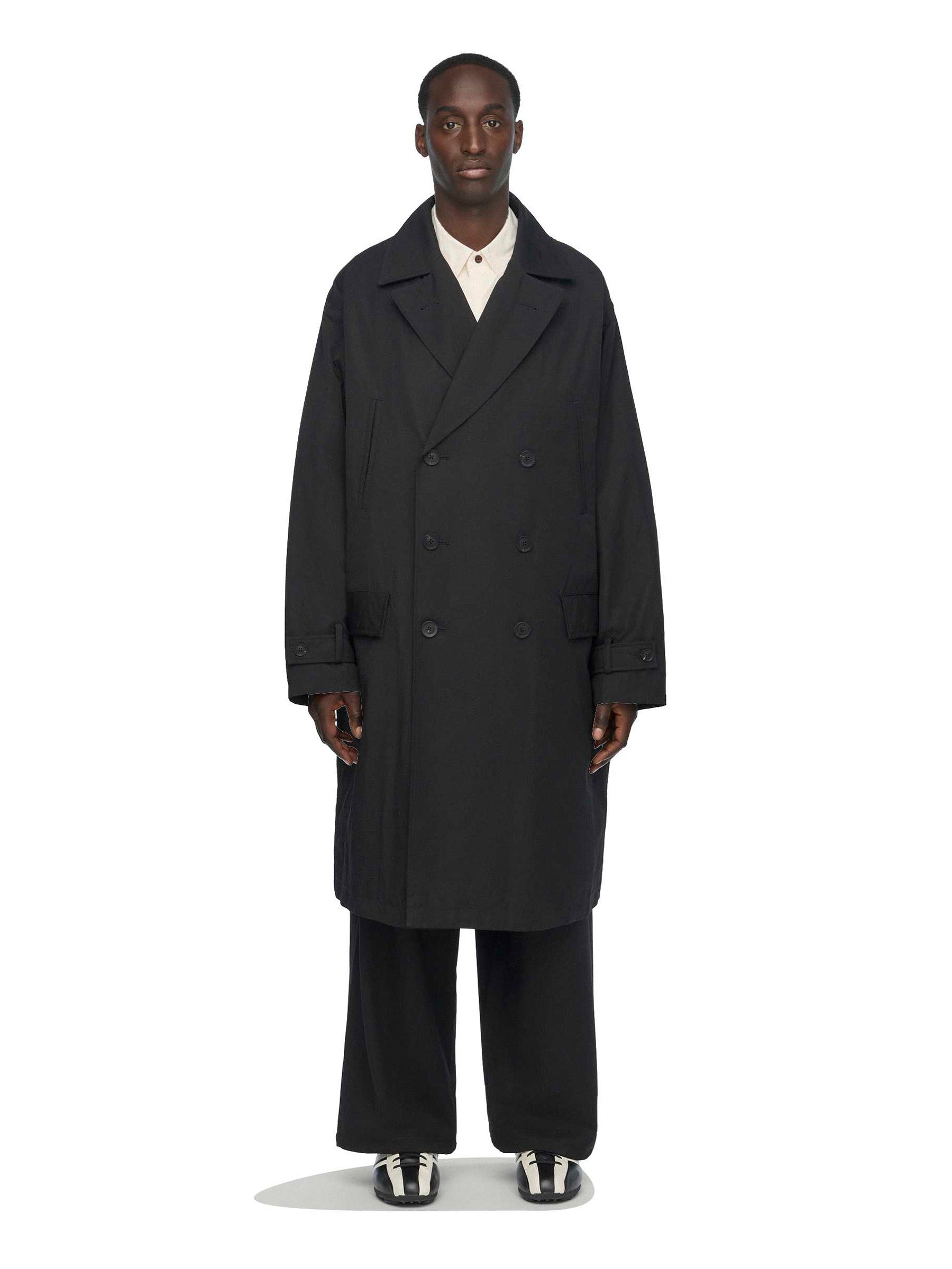 Model wearing the Y-3 Spun Nylon Cabban Coat in Black from the front.