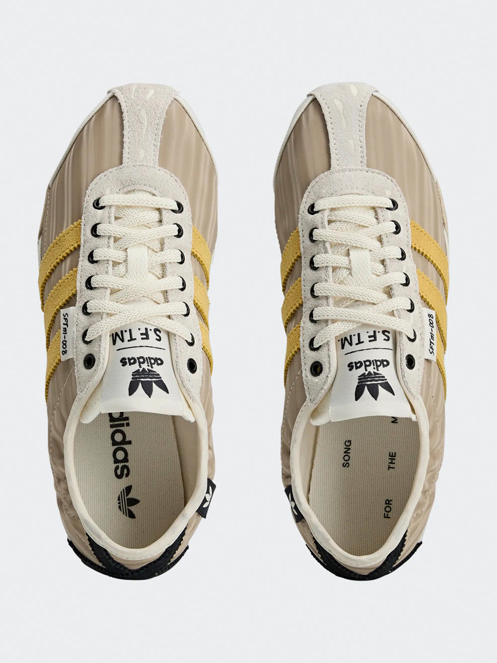 Adidas Tokyo W SFTM in Off White/Yellow/Black - front view of pair showing off white toe cap and yellow three stripes