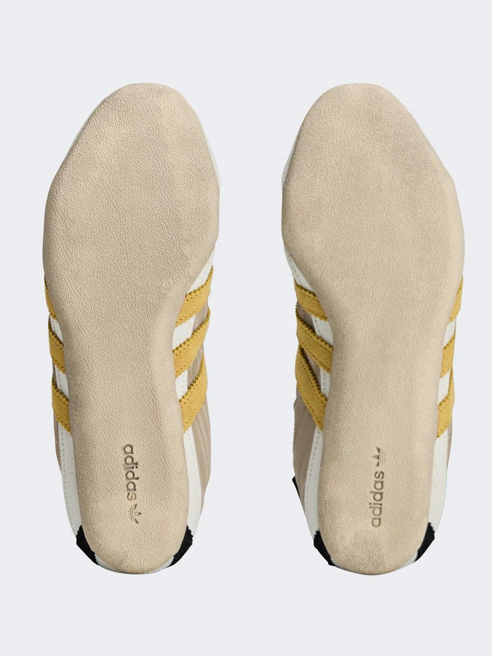 Adidas Tokyo W SFTM in Off White/Yellow/Black - top view showing off white upper with yellow three stripes and lace-up closure