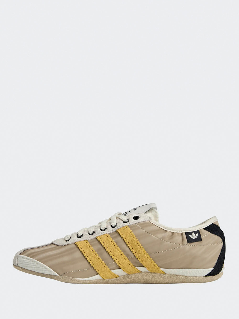 Adidas Tokyo W SFTM in Off White/Yellow/Black - low side view showing off white upper and rubber outsole