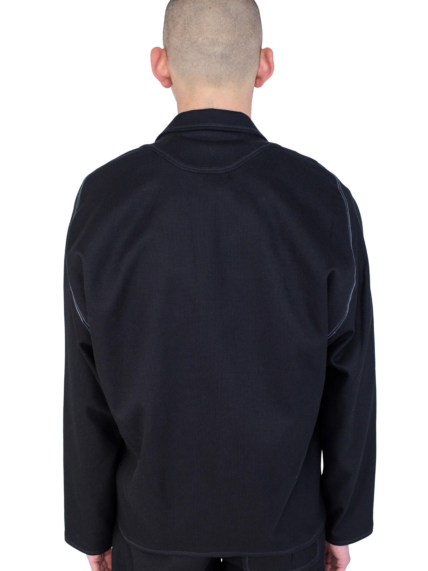 Back detail of the Kiko Kostadinov Vig K-Dart Blazer in Space Black.