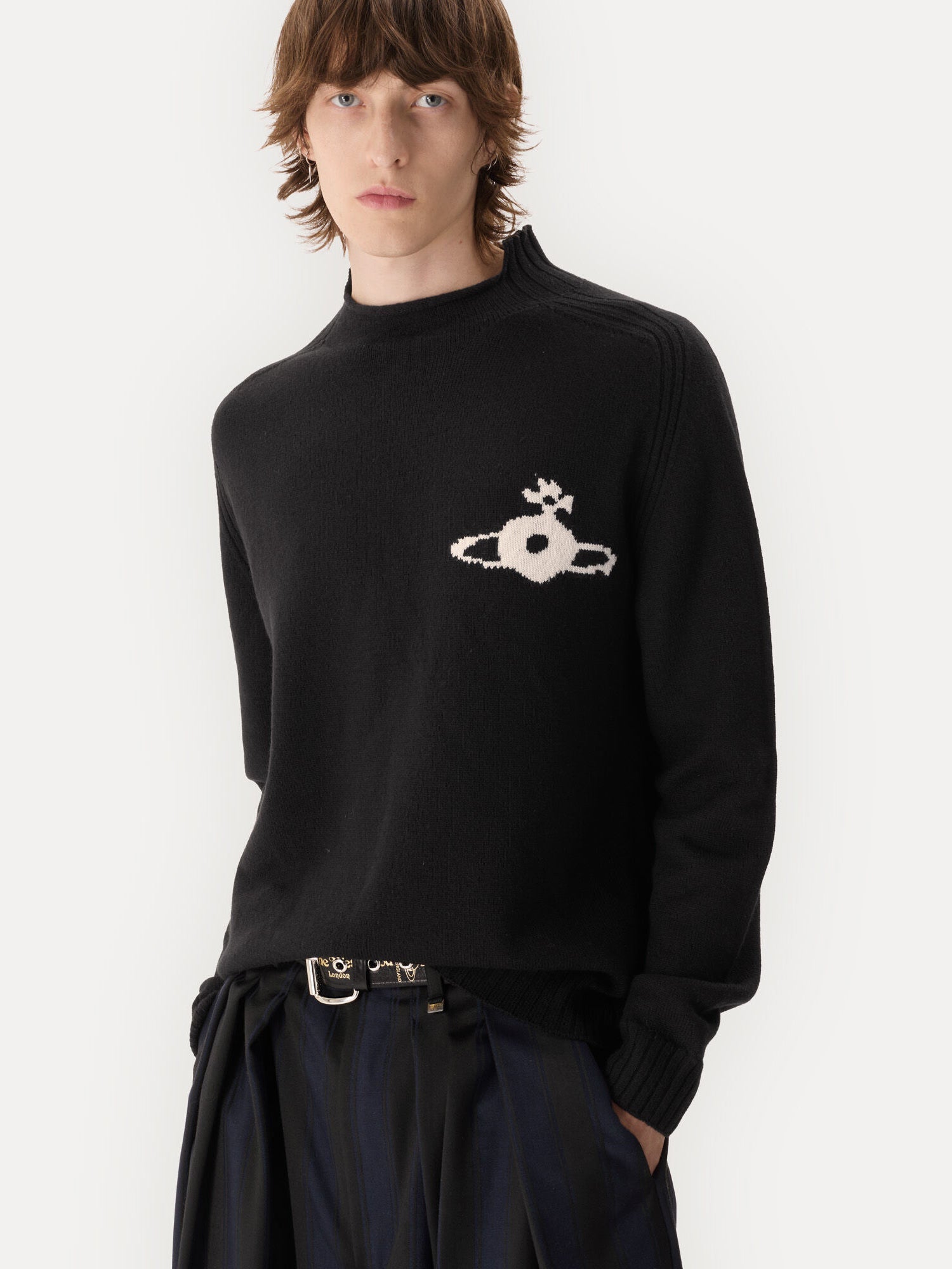 Close-up of Vivienne Westwood Fisherman Jumper in black showing woven orb motif, ribbed mock neck and soft merino knit