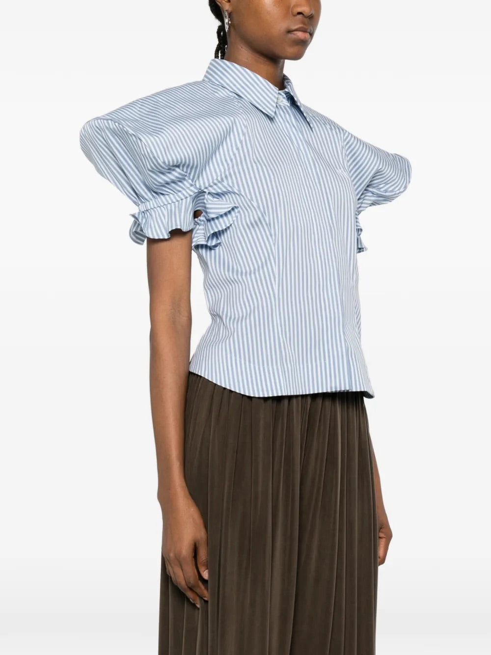 Model wearing Gexy Top in Blue/White by Vivienne Westwood, side view showing relaxed fit and volume of gathered short sleeves on blue and white striped top, Spring/Summer 2026