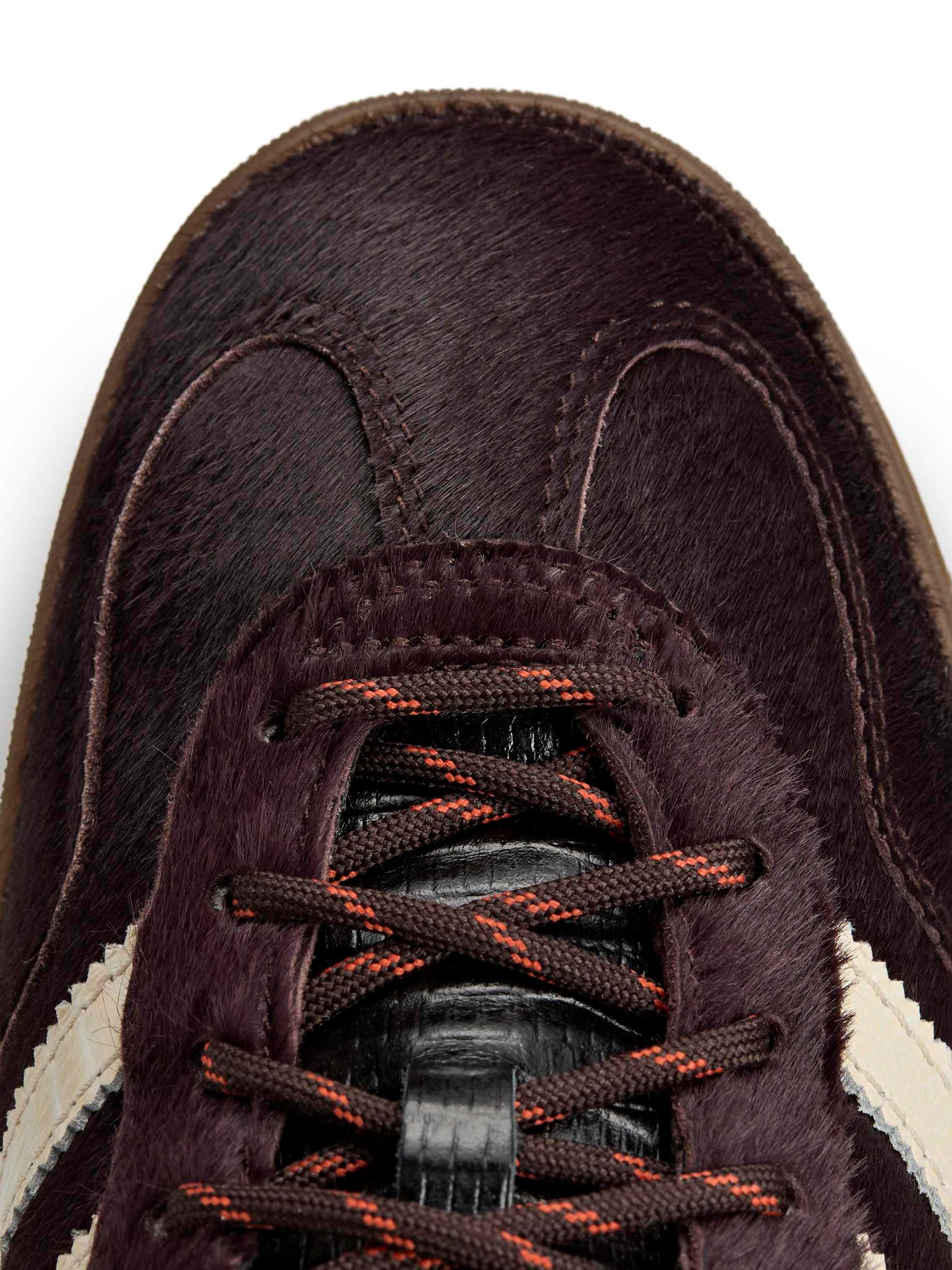 Close-up of pony hair upper, waxed laces with orange fleck and cream three-stripe detail on the Wales Bonner x Adidas Gazelle Pony in Aluminum Wonder White Core Black – Wales Bonner x Adidas SS26