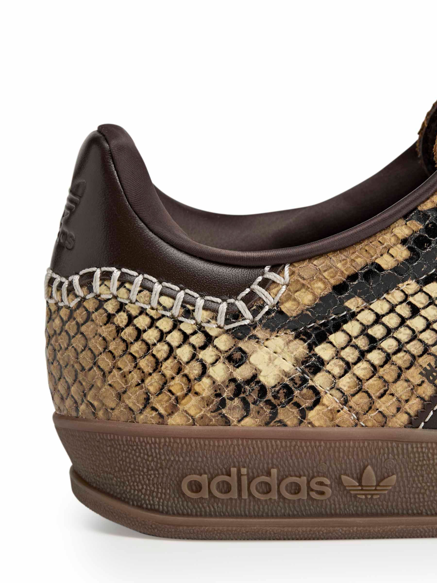 Close-up of snake-embossed leather panel and burgundy three-stripe detail on the Wales Bonner x Adidas Gazelle Snake in Dust Rust Wonder White Collegiate Burgundy – Wales Bonner x Adidas SS26