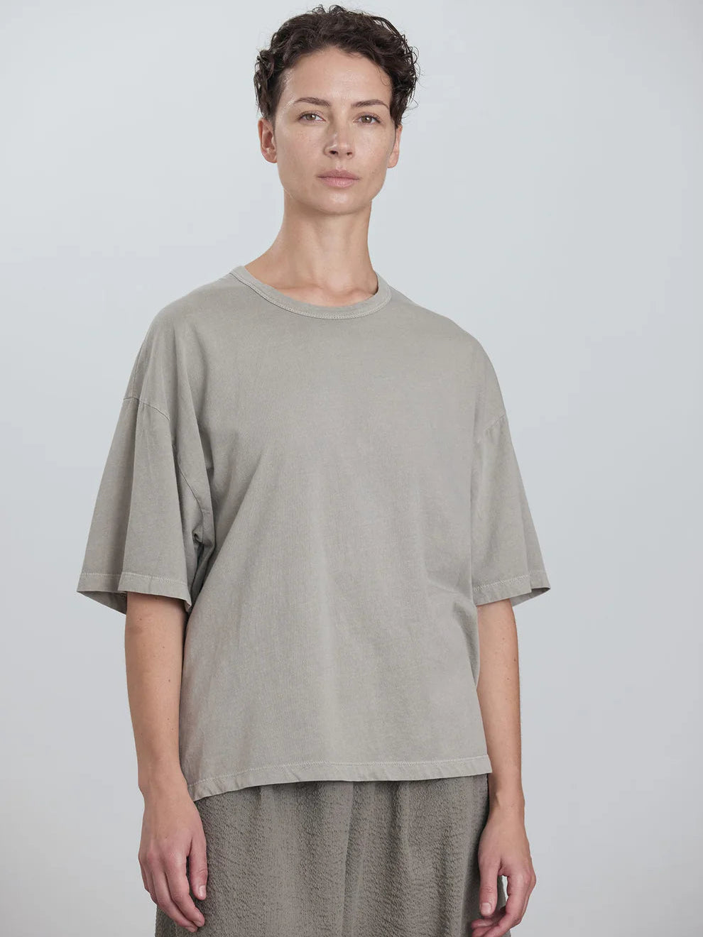 Black Crane Wide Short Sleeve Tee in Grey - full length front view on model showing dropped shoulder and oversized fit