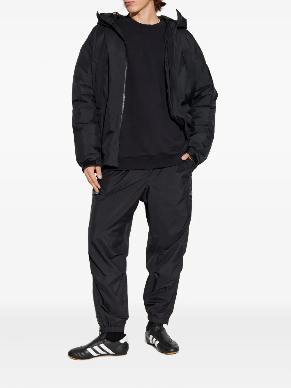 Person wearing Y-3's gote-tex jacket in black
